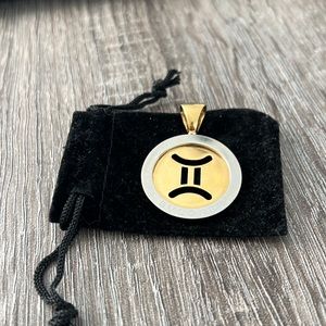 Like new Bulgari gemini pendent.